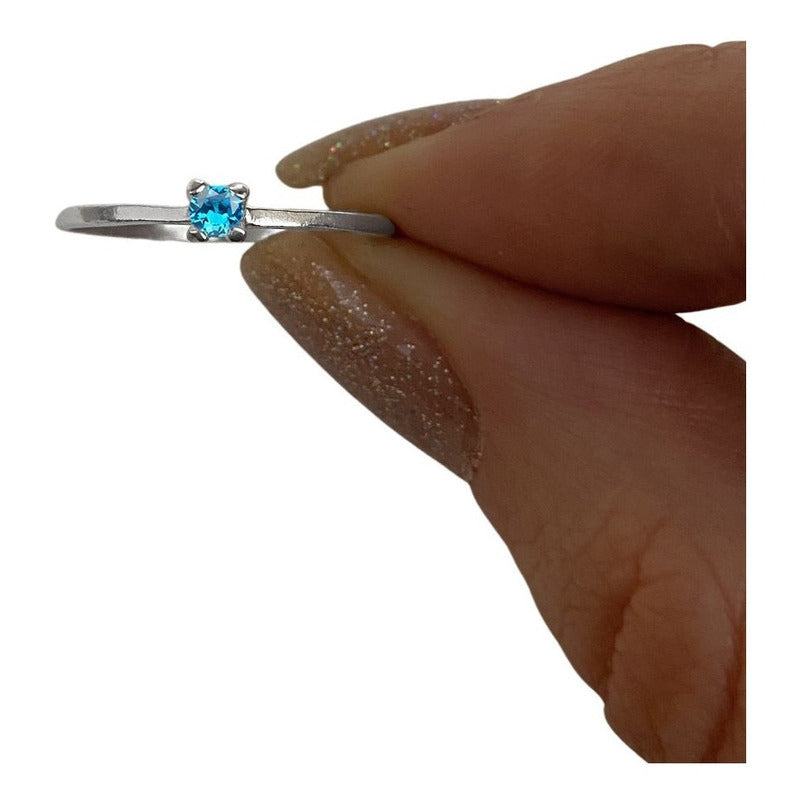 Anillo solitario de topacio azul en plata pura 925 - Mujer